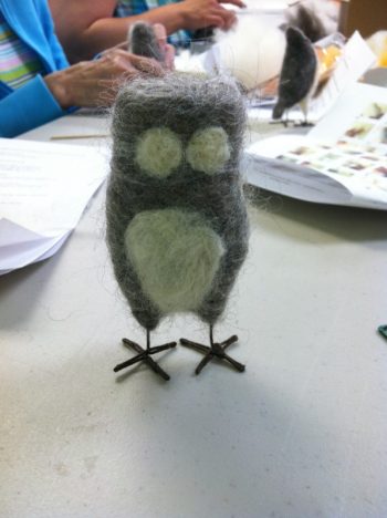 making a felted owl: Work In Process 4 (More white has been added ot this body: this owl has a white breast white around the eyes. Owl is standing on its wire legs for photo)