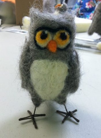 A finished needle-felted owl