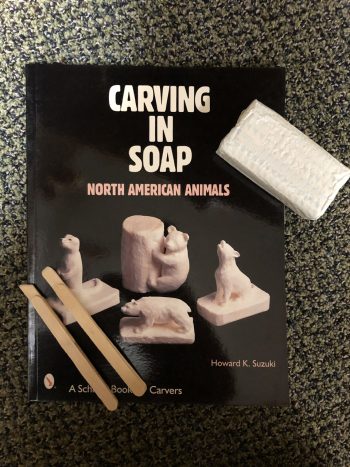 Soap carving kit: book, soap, and two popsicle stick carving tools